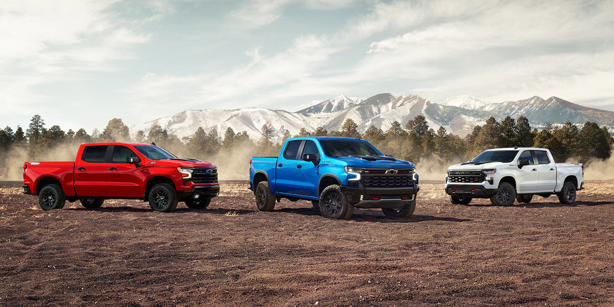 Lineup of Chevrolet Silverado Trucks - Al Serra Chevrolet in Grand Blanc MI