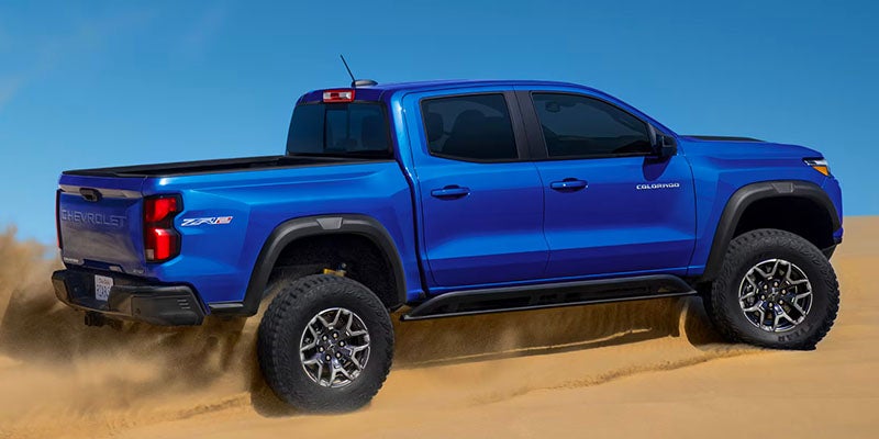 2025 Chevrolet Colorado LD driving through sand - Al Serra Chevrolet in Grand Blanc MI